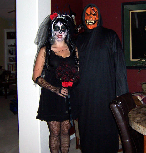 Two people in Halloween costumes